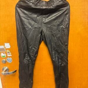Black SPANX leather pants with a fitted skinny silhouette, real pockets, Y2K